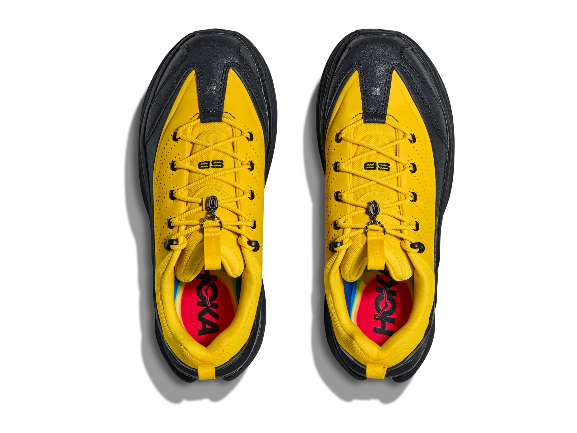 Shop Unisex Elevon X Spencer Badu Zest / Black | HOKA